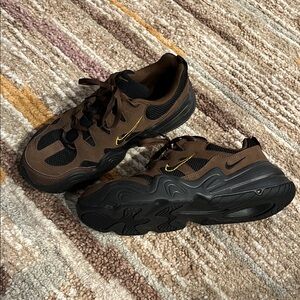 Nike Men's Brown and Black Sneakers with Gold Accents